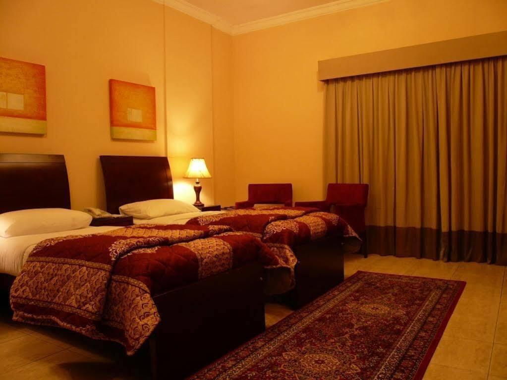 Grand Pj Hotel 拉斯阿尔卡麦 外观 照片